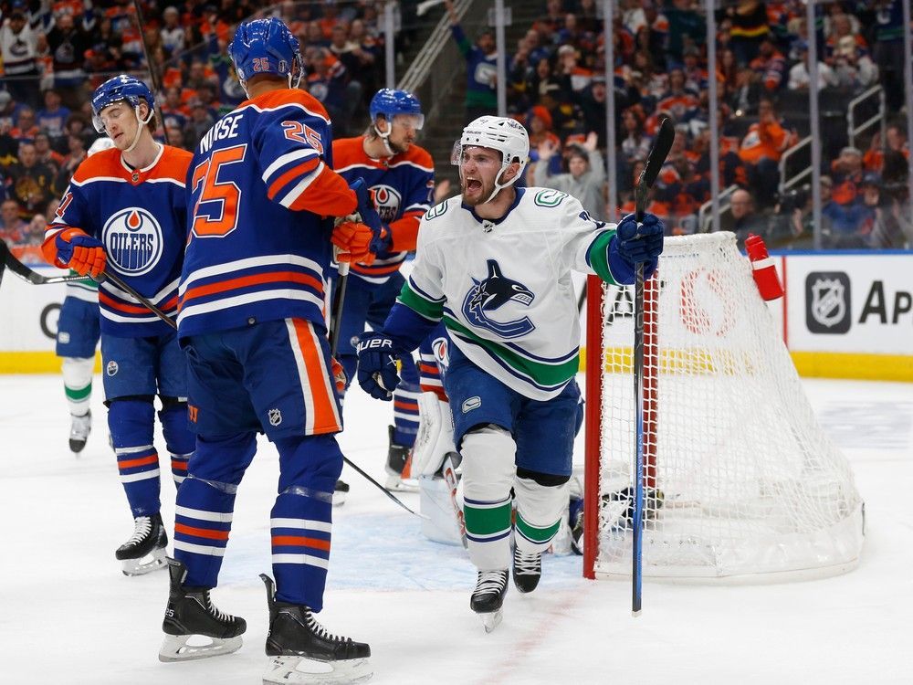 Canucks winger Nils Hoglander celebrates after scoring against the Oilers in Game 6 of a second-round NHL playoff series on May 18 in Edmonton.