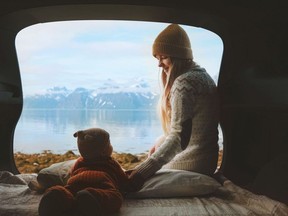 Mother with baby in car family travel vacation road trip woma…