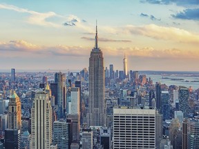 New York City skyline, featuring the very tall Empire State Building.