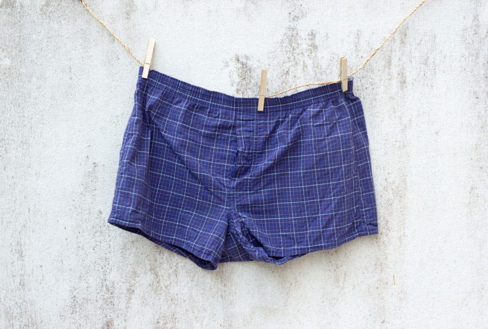 blue boxer underwear on grunge wall