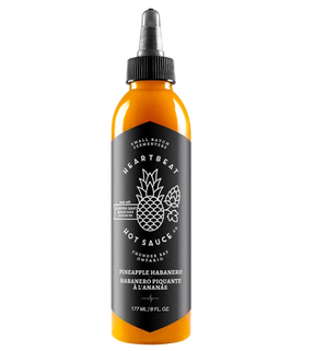 bottle of Heartbeat Hot Sauce Pineapple Habanero