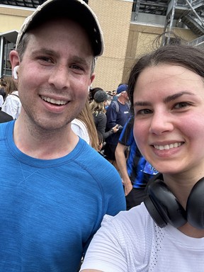 My brother and I smiling through the aches just after crossing the finishing line.