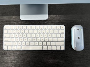 iMac keyboard with a Lock Key in blue.