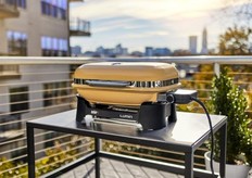 Lumin Compact Electric Grill in Golden Yellow.
