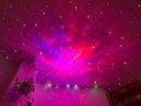 A twinkling starry sky and nebula on my daughter's ceiling.