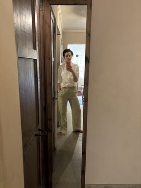 Everlane's Relaxed Oxford Shirt and Reformation linen pants.