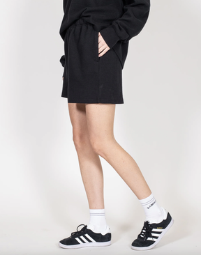 Pack comfy, casual layers like this waffle knit set from Canadian brand BRUNETTE the label.