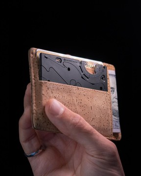 The pocket tripod fits neatly into a wallet.