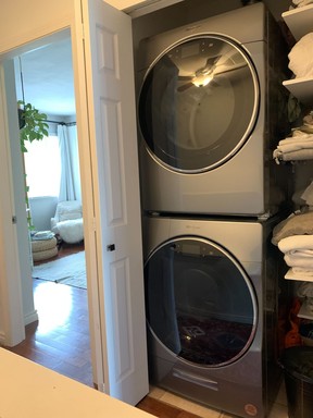 washing and dryer in closet