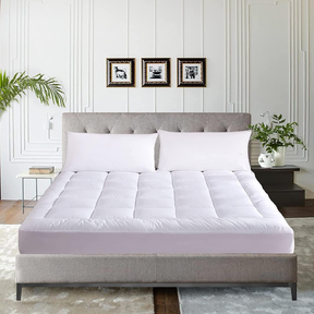 WhatsBedding Waterproof Mattress topper on bed