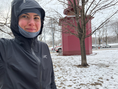 Happy because I'm finished a winter run and I stayed warm. Clothes visible in the photo are the Arc’teryx Beta Jacket and Arc’teryx Rho Hoody.