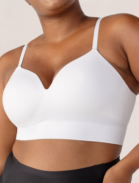 woman wears white Truekind® Supportive Comfort Wireless Shaping Bra