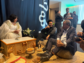 Hailu and Tesfaye sitting chatting after the coffee ceremony.