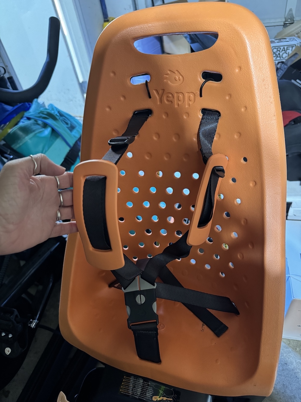  We love the Yepp seat’s five-point harness and ventilation.