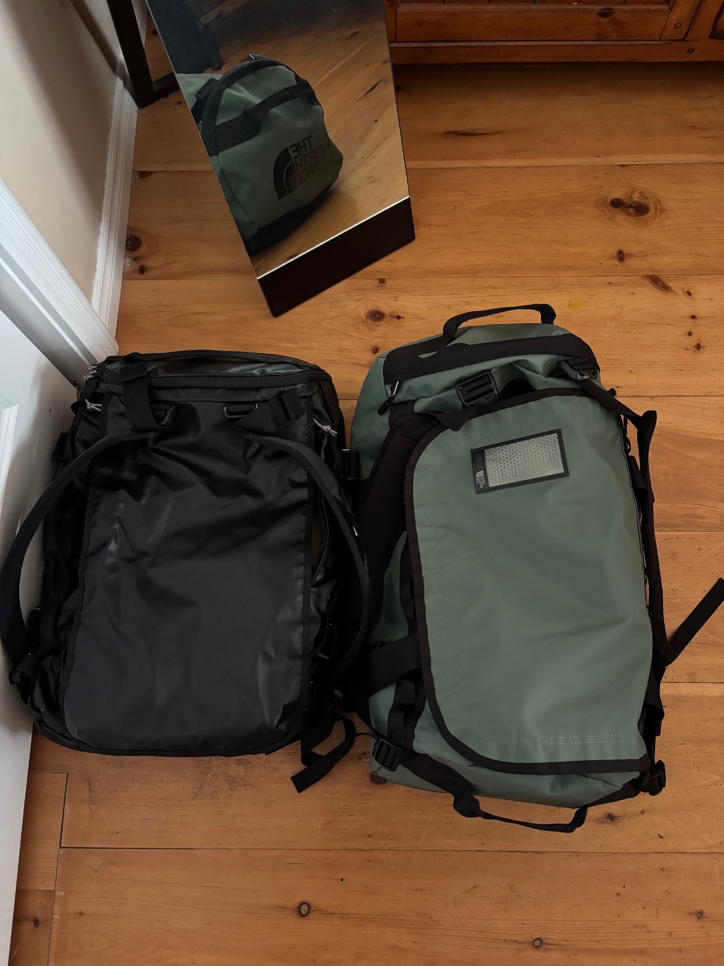  Left: MEC duffel, right: The North Face duffel.