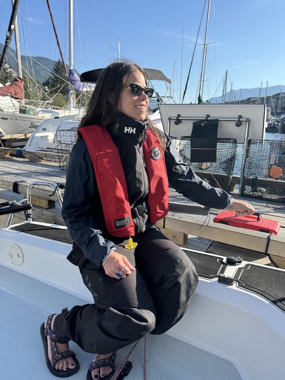  Wearing Helly Hansen base and outerlayer, paired with Zhik salopettes, Teva sandals and a Mustang Survival PFD.
