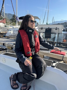 Wearing Helly Hansen base and outerlayer, paired with Zhik salopettes, Teva sandals and a Mustang Survival PFD.