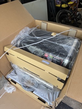The BBQ was delivered in one box, with many parts to piece together.
