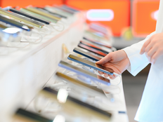 customer choosing a new mobile phone in a shop