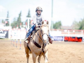 Hayes Smith of Silver Valley rides his horse during the pole-bending event at the Teepee Creek Junior Rodeo event at the Teepee Creek Stampede Grounds in July of  2019. The Teepee Creek Junior Rodeo kicks off the three-day event on Friday morning. With the open for summer plan enacted back in June by the provincial government, the event is open for anyone to attend.