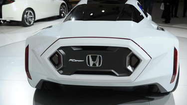 The Honda FC Sport fuel cell concept car is unveiled during the Los Angeles Auto Show on November 19, 2008 in Los Angeles, California.