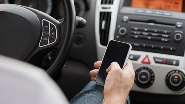 Cellphones are the least of our worries when it comes to being distracted in the car.