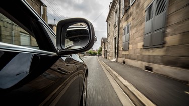 By checking your mirrors, you are not only checking if it is safe for you or your passengers to exit your vehicle, you are also checking if it is safe for anyone on the outside.