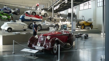 The Deutsches Museum in Munich traces the history of the automobile including a 1929 Alpha Romeo Gran Sport in the foreground and the 1955 Mercedes 300SLR that won the second running of the famous Mille Miglia race.