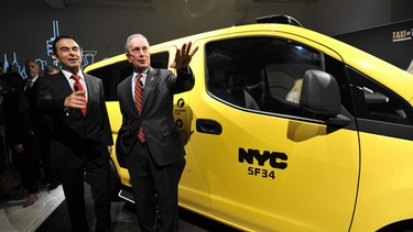 Nissan CEO Carlos Ghosn and New York City Mayor Michael Bloomberg unveil the Nissan NV200 taxi.