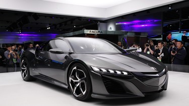 The Acura NSX Concept is shown at media previews for the 2013 North American International Auto Show in Detroit.