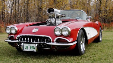 A big superchager rises out of the engine bay of Ed Grieve's 1959 Chevrolet Corvette in this Edmonton file photo.