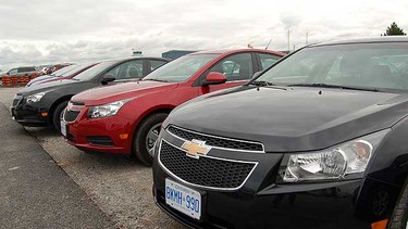 2011 Chevrolet Cruze. Winner: Small car, over $21k.