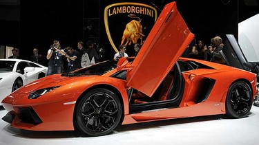 Lamborghini Aventador LP 700-4 is displayed at the car maker's booth on March 1, 2011 at Geneva Motor Show in Geneva. Car makers display 170 new models as the automobile industry preview the 81st Geneva Motor Show.