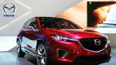 A Mazda SUV Prototype is displayed at the car maker's booth during the Geneva Motor Show.