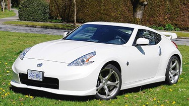 The 2011 Nissan Nismo 370Z: The Nismo's integrated front spoiler, special side skirts and unique rear bumper give it an aggressive look.