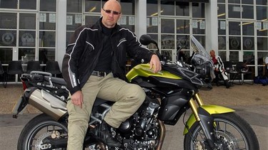 David Booth with a 2011 Triumph Tiger 800.