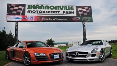 The 2012 Audi R8 GT (right) v. the 2011 Mercedes-Benz SLS AMG.