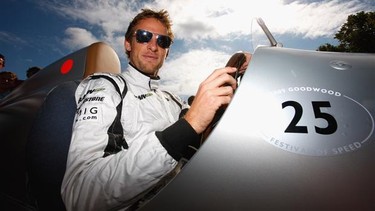 Jenson Button of Great Britain prepares to drive a 1934 Mercedes Benz W25 during day three of The Goodwood Festival of Speed at The Goodwood Estate in 2009.