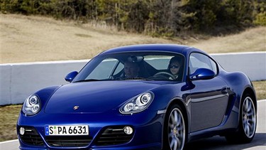 Jodi Lai drives a Porsche Cayman S with instructor Stef Vancampenhoudt at Mosport International Raceway in Bowmanville, Ontario.