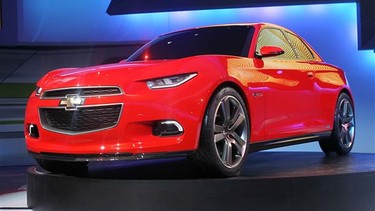 Chevrolet introduces the Code 130R concept vehicle during the press preview at the North American International Auto Show.