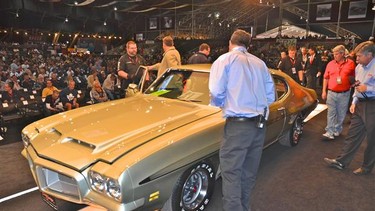 A Pontiac GTO on the auction block at the 2012 Barrett-Jackson auction in Scottsdale, Ariz.