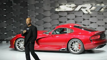 Ralph Gilles, president and CEO of SRT Brand and Motorsports Chrysler, wears a Detroit t-shirt while introducing the new 2013 SRT Viper at the New York International Auto Show.