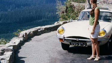 Jackie Wainwright with the new 1970 Jaguar XKE coupe on an extended honeymoon with husband Michael in Europe.