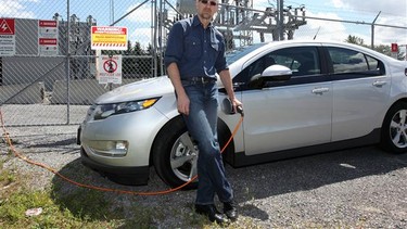 David Booth with 2011 Chevrolet Volt.