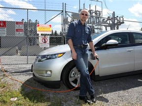 David Booth with 2011 Chevrolet Volt.