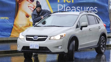 Mountain Film Festival director Alan Formanek and 2013 Subaru Outback in North Vancouver B.C.