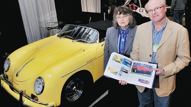 Paula Reisner of sports car builder Intermeccanica checks out the new book on the firm with author Andrew McCredie at the recent Vancouver International Auto Show.