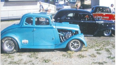 George Criddle's 1933 Willys coupe (left) alongside two other Willys drag cars. Criddle competes at the quarter-mile at Eagle Motorplex Drag Strip every year.