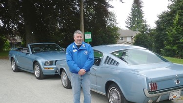 Pat Comey with his parents’ original 1965 Mustang 2+2 Fastback and his 2005 Windveil Blue Mustang GT convertible. Alyn Edwards photos/special to the sun