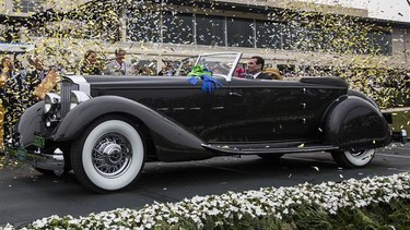 In a photo provided by Rolex, the 1934 Packard 1108 Twelve Dietrich Convertible Victoria, owned by Joseph & Margie Cassini III, from West Orange, New Jersey, took the “Best of Show Award” at the Pebble Beach Concours d’Elegance in Pebble Beach, Calif.